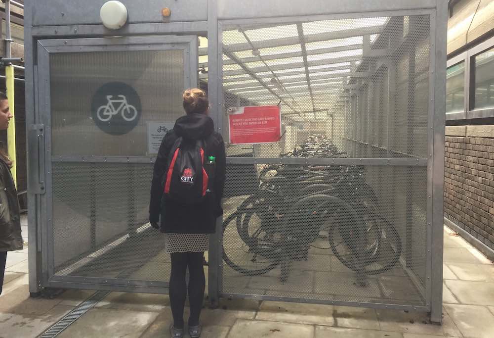 Julie entering bike shed