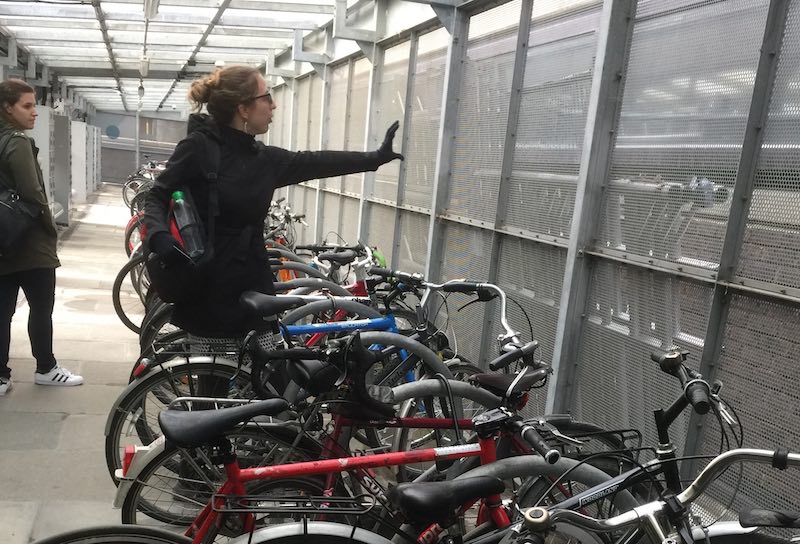 Julie and Emily looking around bike shed