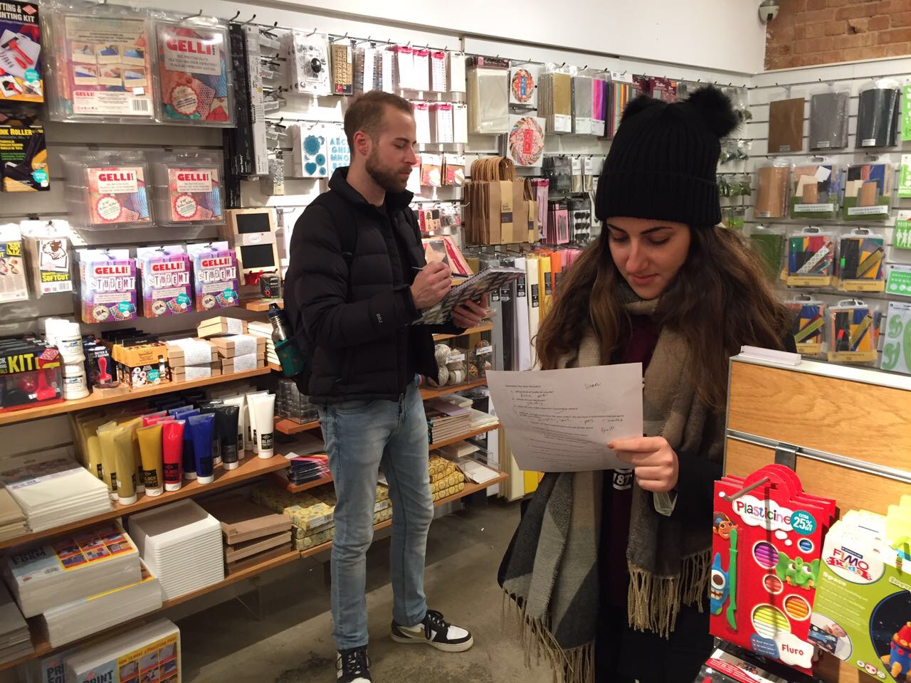 Teammates scouring a craft store